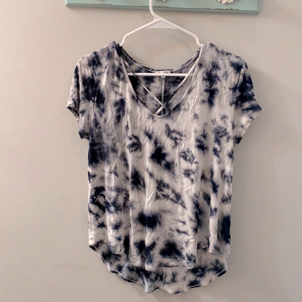Dark blue and white tie dyed shirt.